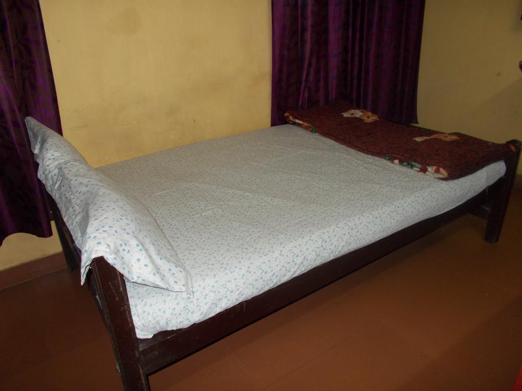 Готель Guruvayur Bunglow Екстер'єр фото